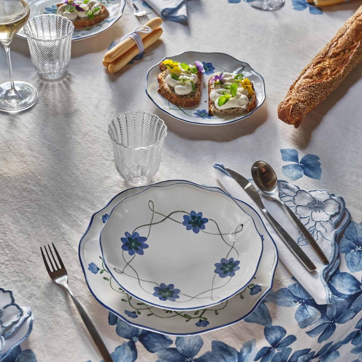 A Coincasa table laid with leaf plates