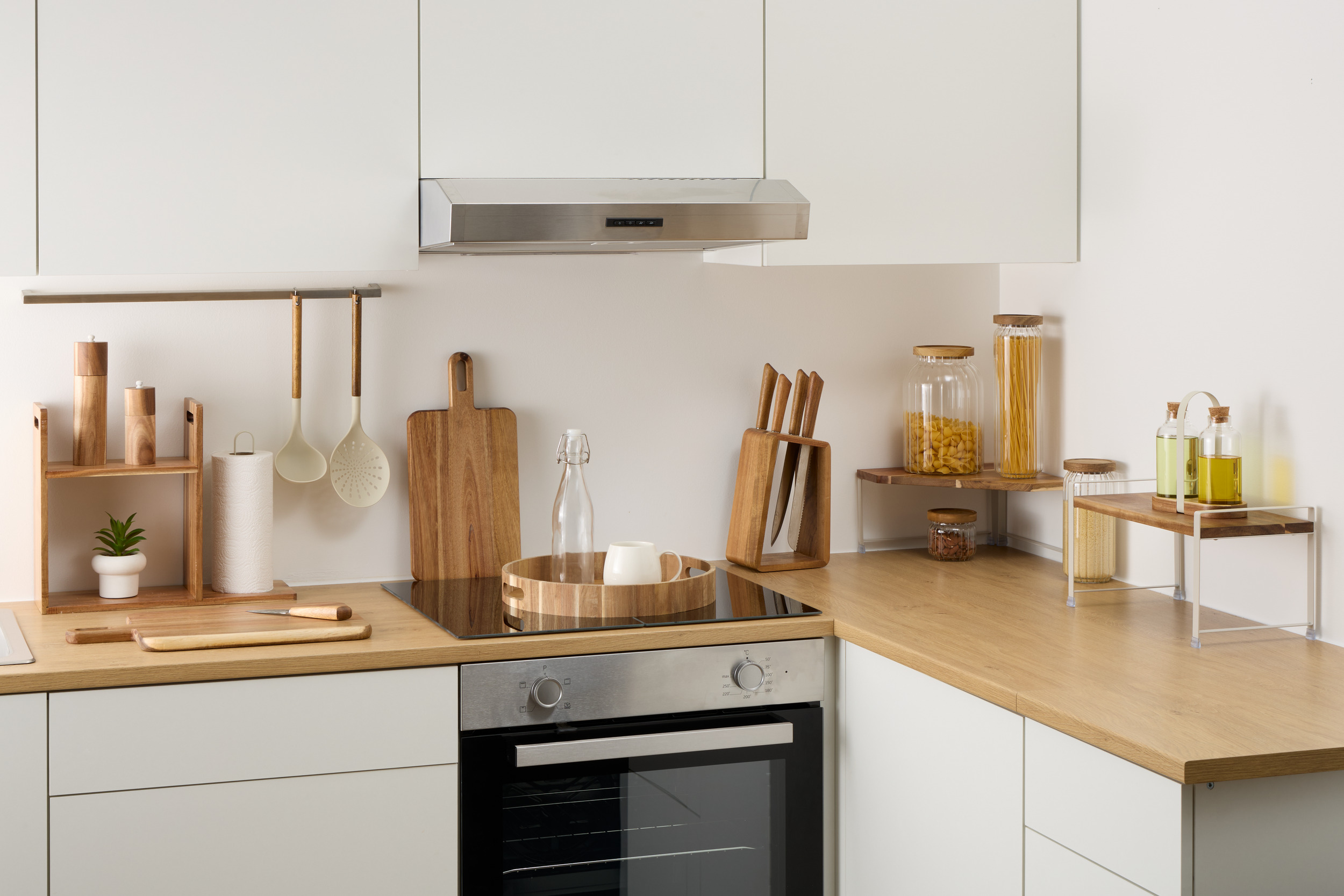 Neatly arranged kitchenware and cookware on open shelving
