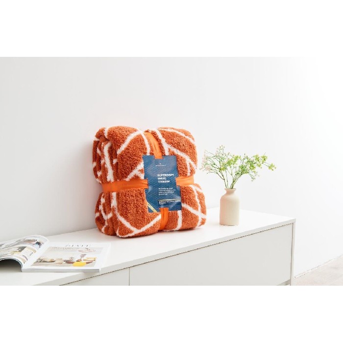 home-textiles/blankets-throws/teddy-throw-ely-geo-200cm-x-240cm-rust
