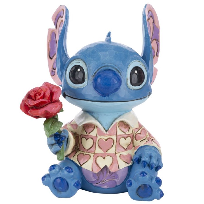 home-decor/decorative-ornaments/disney-traditions-stitch-clueless-casanova-valentine-figurine-–-6001280